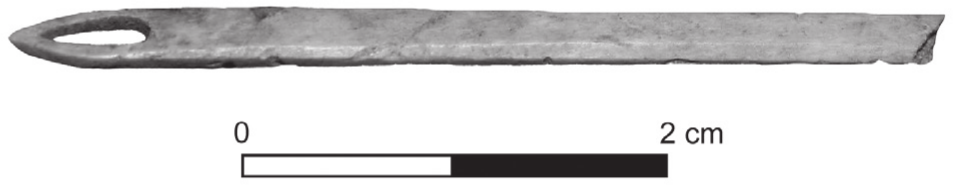 A black and white photograph of a bone netting needle. It is just over two centimetres and has a teardrop-sized hole at the end.