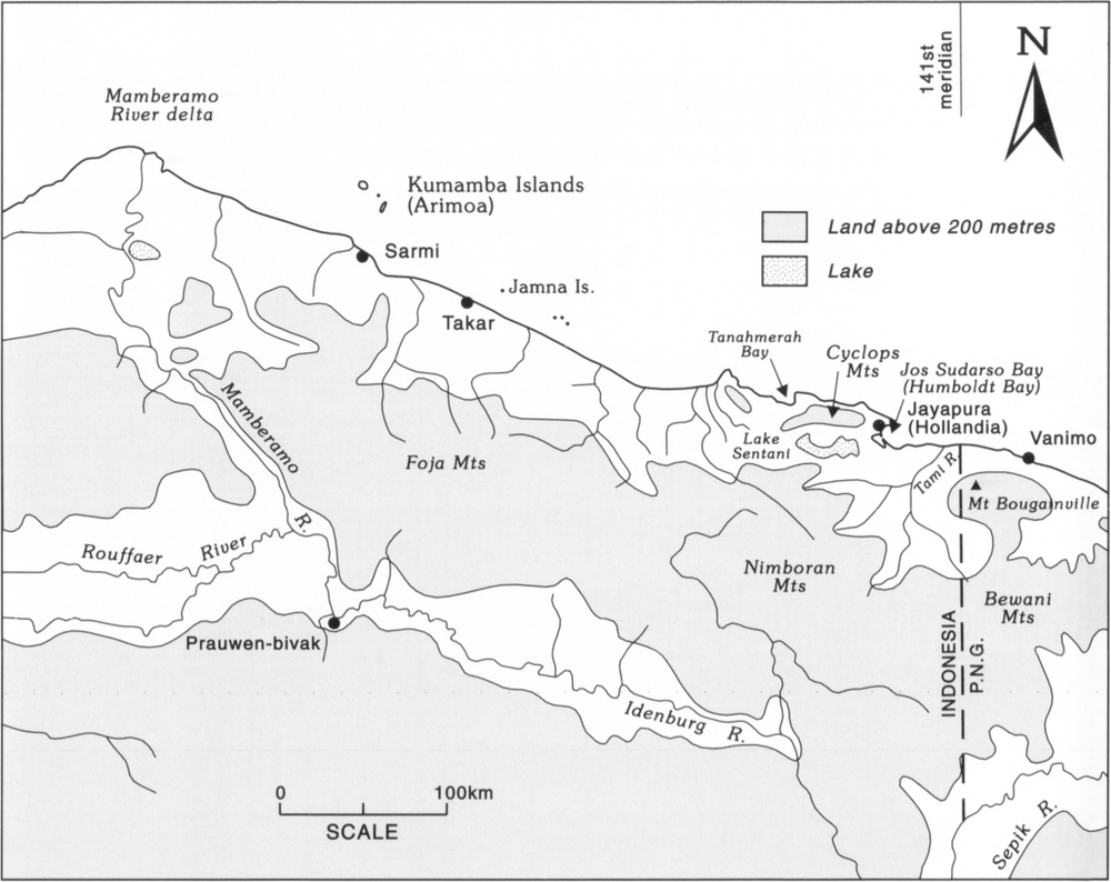 Map at scale of 1 inch to 100km which shows the coastal mountainous regions within the north coast of Indonesia, with a small portion of Papua New Guinea towards the far right as separated by a vertical dotted line to mark the border between the countries. There are a couple of small lakes in sight as indicated by dotted patches, with one towards the Mamberamo River delta towards the top-left of the map, and Lake Sentani north of the Nimboran Mountains at the eastern border of Indonesia. Areas such as the Foja Mountains, Nimboran Mountains, and Cyclops Mountains of Indonesia as well as Mount Bougainville and Bewani Mountains of Papua New Guinea are shaded in grey to mark land above 200 metres. There is also a note on the map which cites, ‘141st meridian’. 