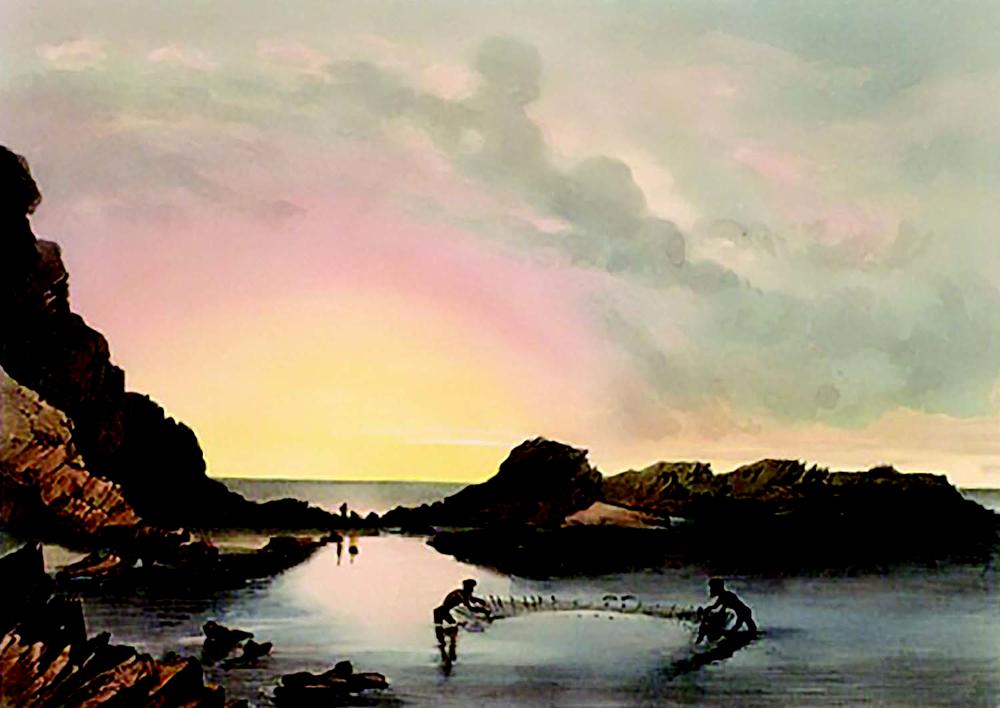 Historical illustration of a coastal scene at sunset, showing two Aboriginal people in shallow water using a woven net to fish. Rocky outcrops frame the inlet on both sides, with calm water reflecting the sky. Two additional figures are visible in the distance near the horizon. The overall setting suggests a serene coastal environment with rugged terrain and dramatic cloud formations.