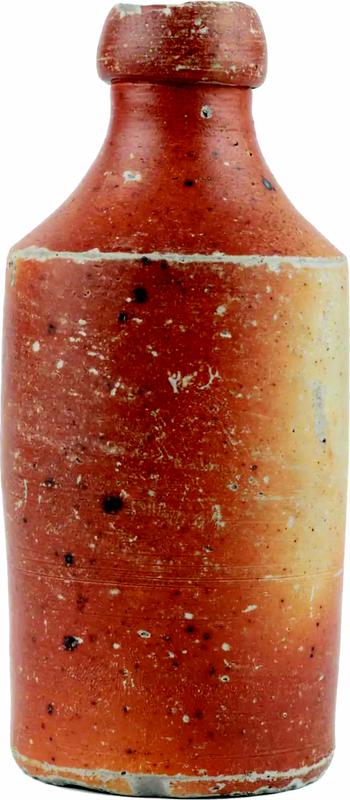 A weathered ceramic bottle against a white background.