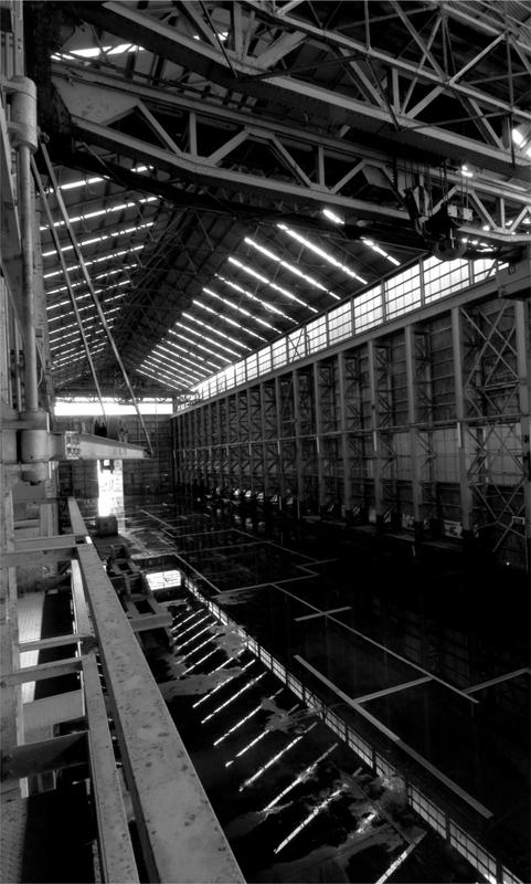A large open room with exposed beams.