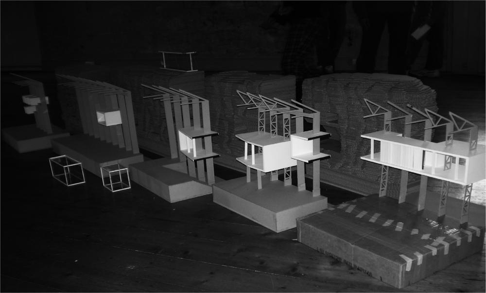 Black and white photograph of models of buildings.
