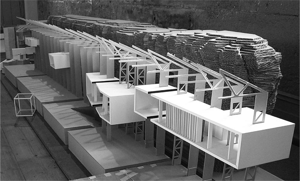 A black and white photograph of models of buildings.