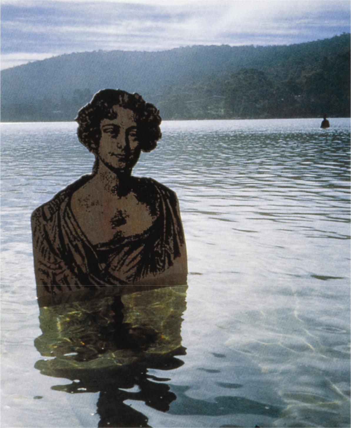 An artwork of a bronzed woman in the water with a mountain landscape in the background.