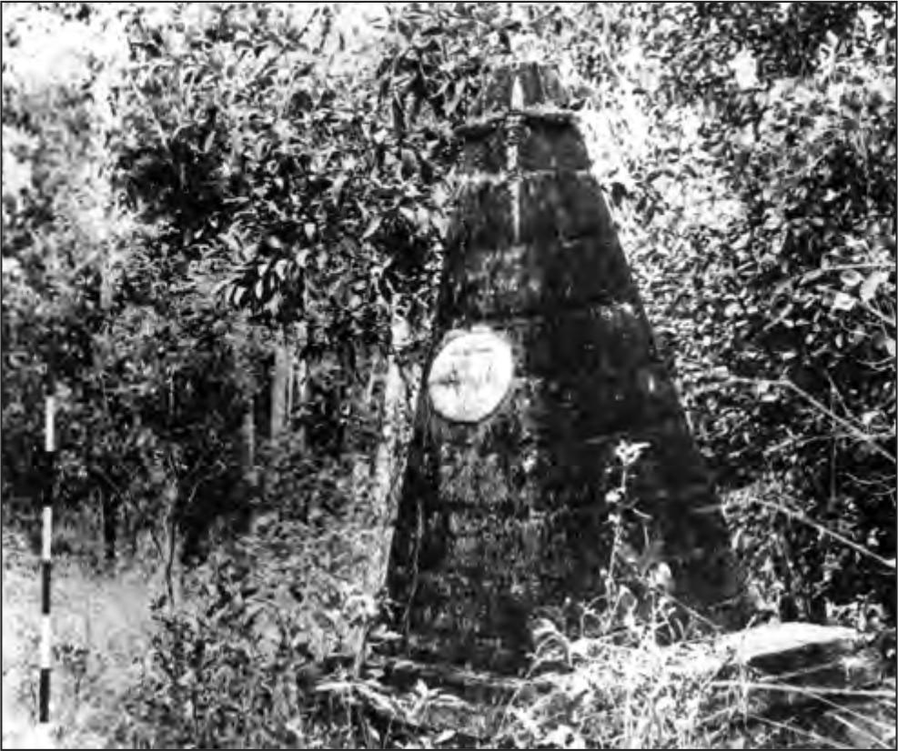 A black and white photograph of a cone-shaped vault. It has a white circle on it.