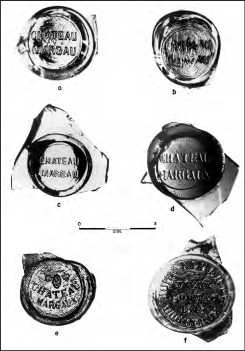 A black and white photograph of six bottle seals with the brand 'Chateau Margau'.