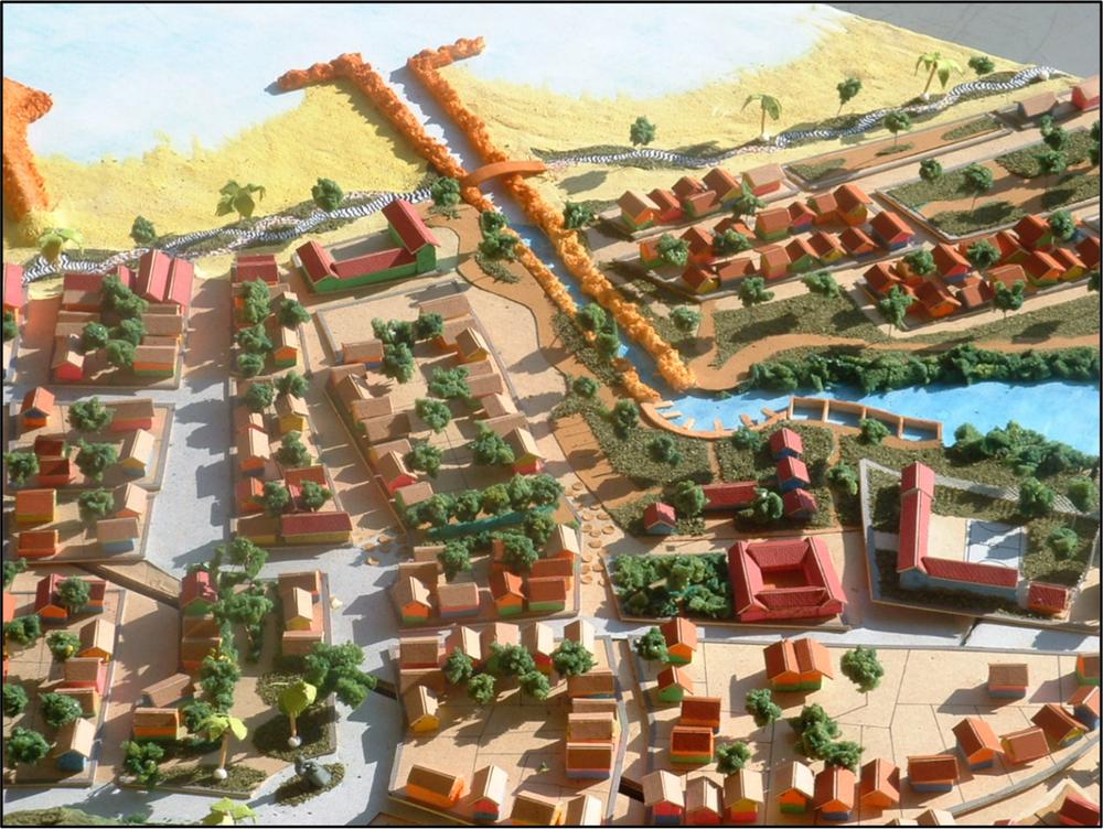 A model of Manzanillo del Mar with the beach and resorts.