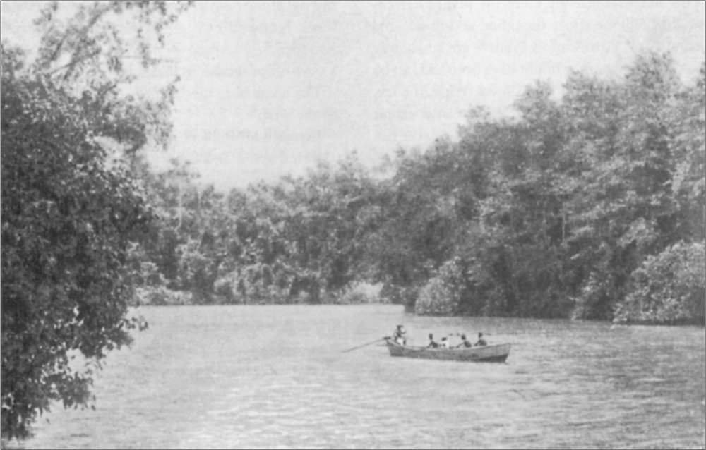 Black and white image of a lake with a rowboat and people in the centre of the lake.