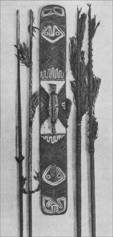 Black and white image of shield and spears.