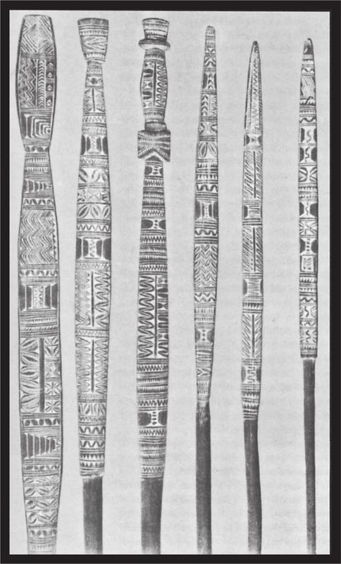 Black and white image of various dance sticks.
