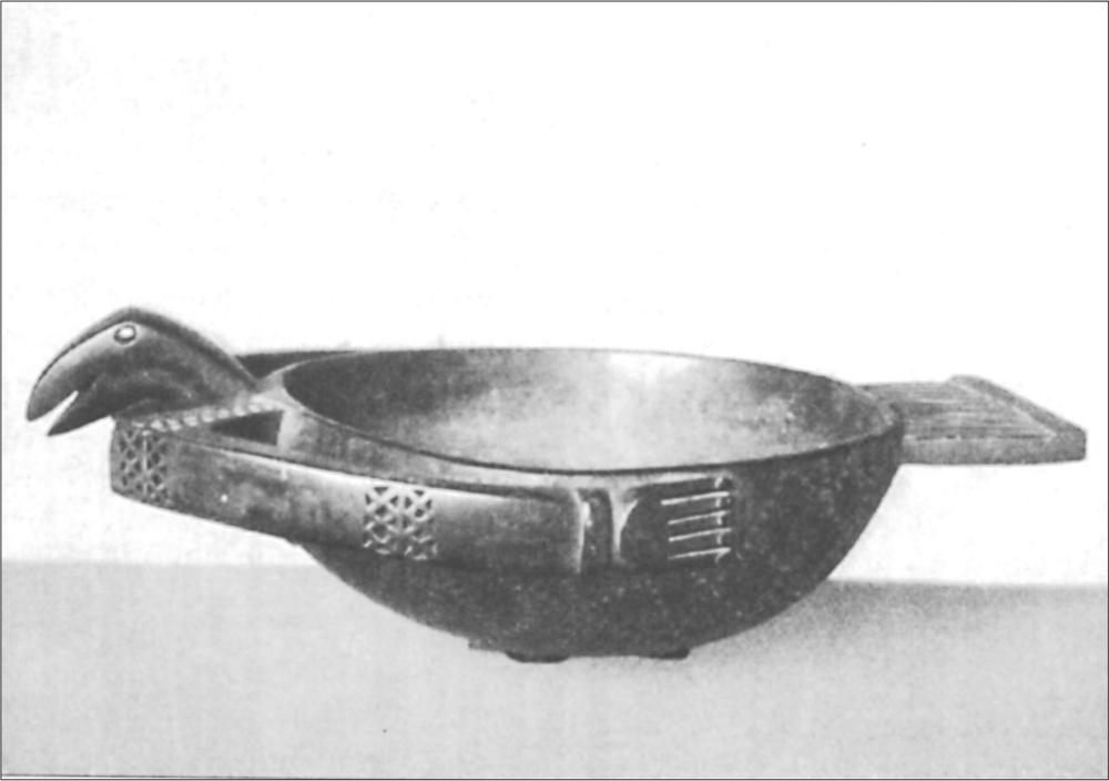 Black and white image of wooden bowl.