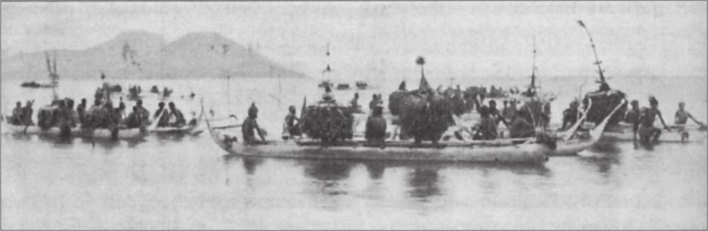 Black and white image of long canoes filled with people on the water.