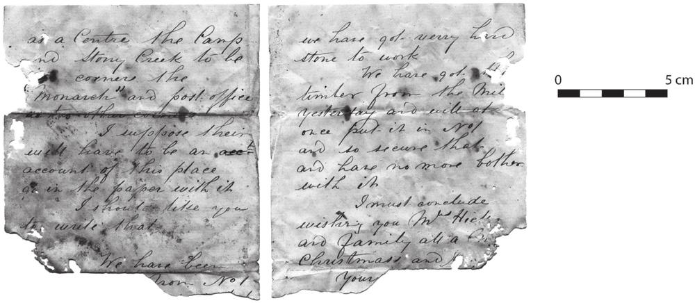 A black and white photograph of two pages of a letter. 