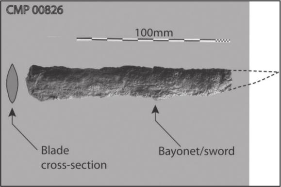 A black and white photograph corroded shard with a pointed edge.